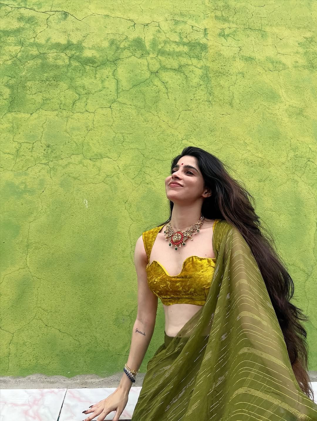 Divya Bharathi Stuns in Olive Green Saree and Yellow Blouse Photos (6)