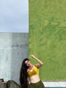 Divya Bharathi Stuns in Olive Green Saree and Yellow Blouse Photos (8)