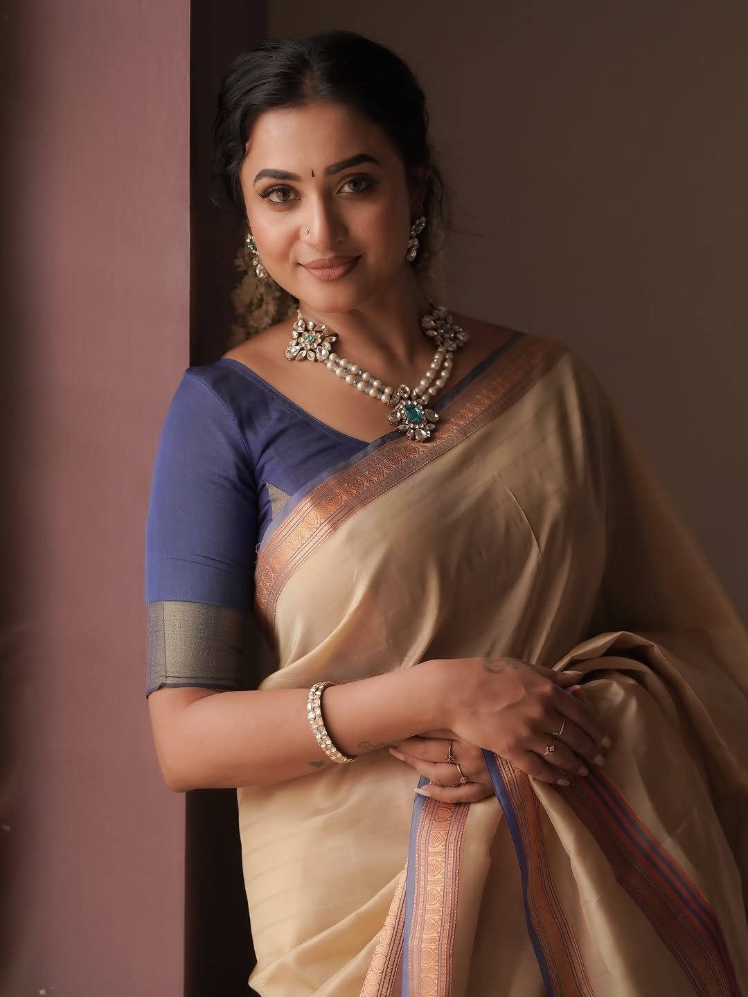 Janani Ashok Kumar in Traditional Beige Silk Saree with Statement Jewelry (9)