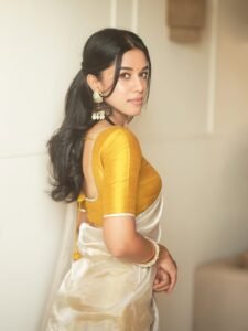 Mirnalini Ravi Elegant in Yellow Blouse and Sheer White Saree (2)