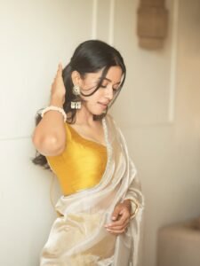 Mirnalini Ravi Elegant in Yellow Blouse and Sheer White Saree (3)