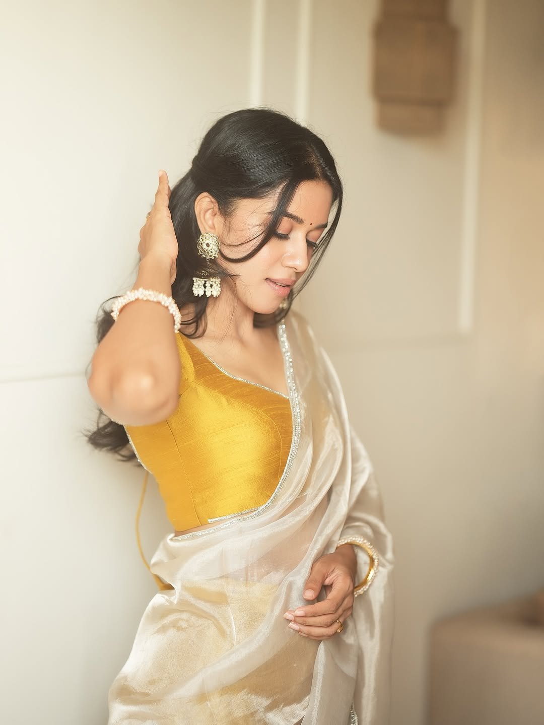 Mirnalini Ravi Elegant in Yellow Blouse and Sheer White Saree (3)