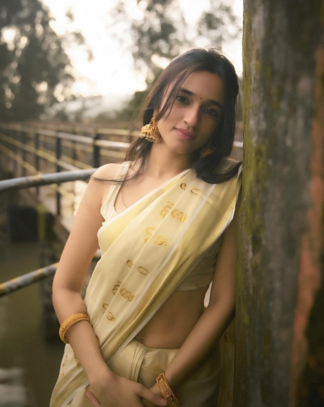 Nuveksha Charms in Traditional Off White Kerala Saree Photos (1)