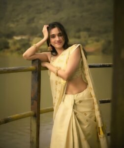 Nuveksha Charms in Traditional Off White Kerala Saree Photos (13)