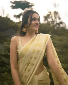 Nuveksha Charms in Traditional Off White Kerala Saree Photos (15)