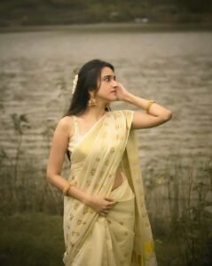 Nuveksha Charms in Traditional Off White Kerala Saree Photos (18)