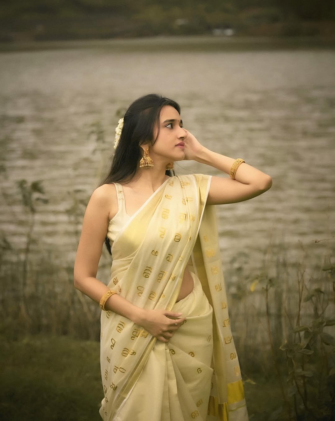 Nuveksha Charms in Traditional Off White Kerala Saree Photos (18)