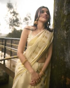 Nuveksha Charms in Traditional Off White Kerala Saree Photos (2)