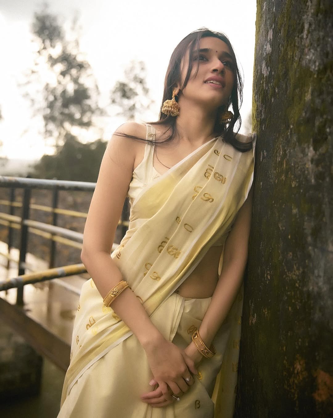 Nuveksha Charms in Traditional Off White Kerala Saree Photos (2)