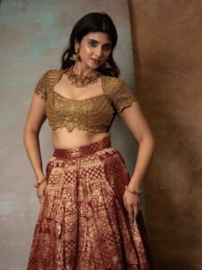 Pragya Nagra Stuns in Maroon Gold Lehenga Photos (1)