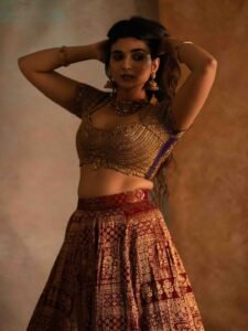 Pragya Nagra Stuns in Maroon Gold Lehenga Photos (16)