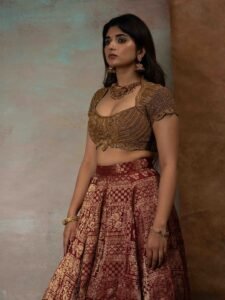 Pragya Nagra Stuns in Maroon Gold Lehenga Photos (2)