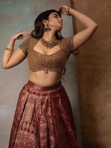 Pragya Nagra Stuns in Maroon Gold Lehenga Photos (3)