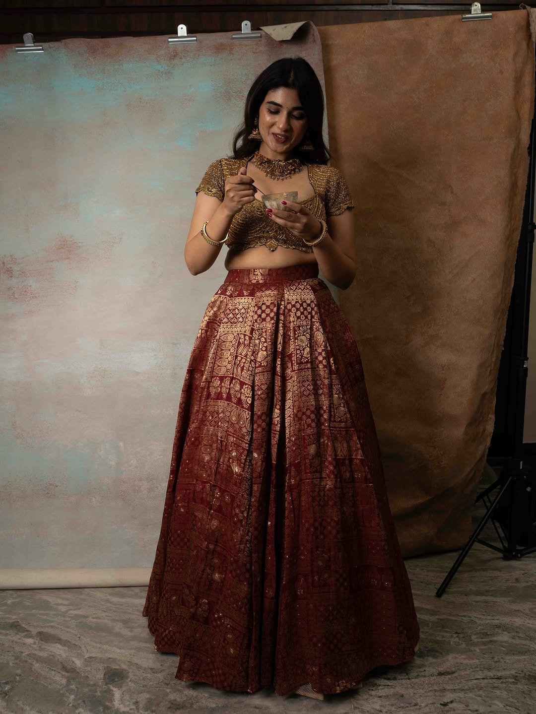 Pragya Nagra Stuns in Maroon Gold Lehenga Photos (4)