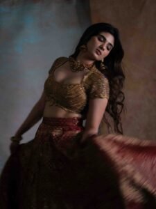 Pragya Nagra Stuns in Maroon Gold Lehenga Photos (9)