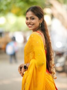 Srija Dhammu Smiling in Yellow Saree (12)
