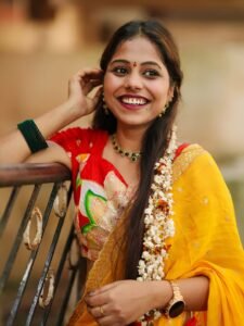 Srija Dhammu Smiling in Yellow Saree (14)