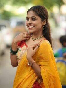 Srija Dhammu Smiling in Yellow Saree (16)
