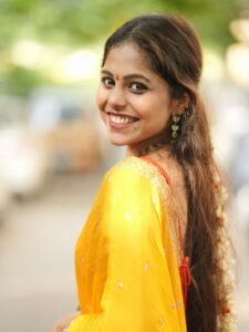 Srija Dhammu Smiling in Yellow Saree (4)