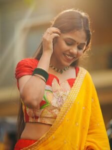 Srija Dhammu Smiling in Yellow Saree (8)