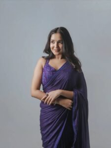 Anikha Surendran youthful purple saree HD stills – ActorFacts exclusive