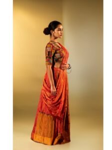 Anupama Parameswaran in mustard Kanchipuram saree with gold border