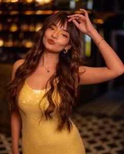 Anushka Sen in shimmery yellow sequin dress during 2025 photoshoot