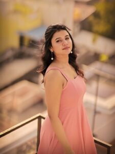 Arul Jyothi in blush pink chiffon co-ord set in blooming garden