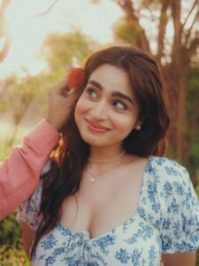 Ayesha Khan in sage green linen co-ord set in misty forest