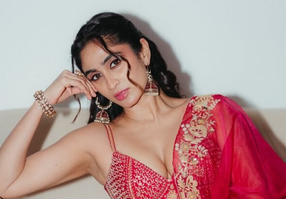 Deepti Sati in crimson Banarasi saree with gold zari during bridal shoot