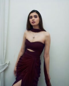 Diana Penty in deep maroon satin gown during elegant 2025 photoshoot