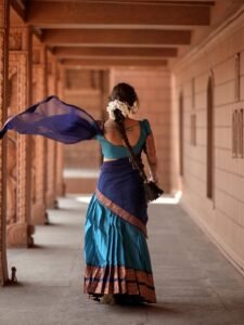 Close-up of Eesha wearing silver chandbalis and jasmine bun
