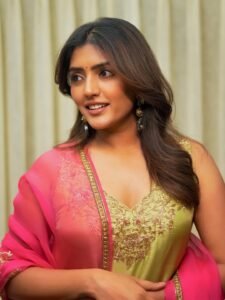 Eesha Rebba in yellow Anarkali with pink dupatta during garden photoshoot