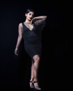 Priyanka Jain in black satin corset dress with gloves during 2025 shoot