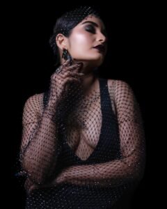 Priyanka Jain in black satin corset dress with gloves during 2025 shoot