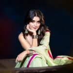 Priyanka Jain in sage green cotton-silk saree by riverside at dawn