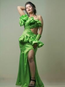 Priyanka Jain in emerald green satin gown during ballroom photoshoot
