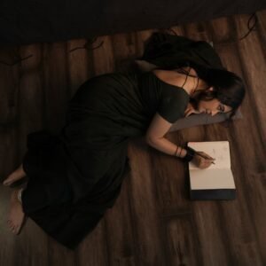 Close-up of Priyanka wearing silver chandbalis and smoky eye makeup