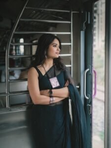 Priyanka Jain in black Kota Doria saree with silver zari during studio shoot