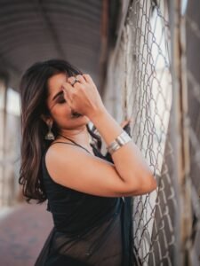 Priyanka Jain in black Kota Doria saree with silver zari during studio shoot