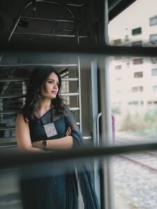 Priyanka Jain in black Kota Doria saree with silver zari during studio shoot