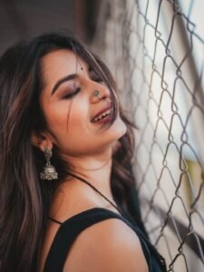 Priyanka Jain in black Kota Doria saree with silver zari during studio shoot