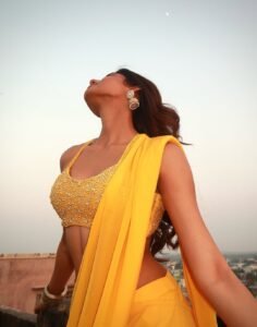 Trisha Shetty in mustard Mysore silk saree with gold border at palace