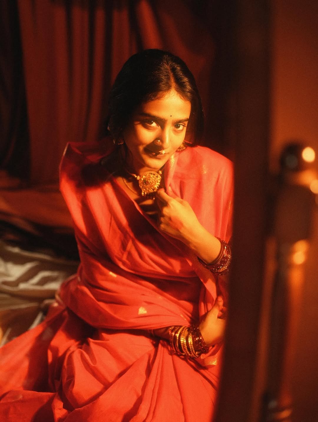 Yoga Lakshmi Golden Hour Close-Up – Traditional Nose Ring & Red Saree Glow (12)