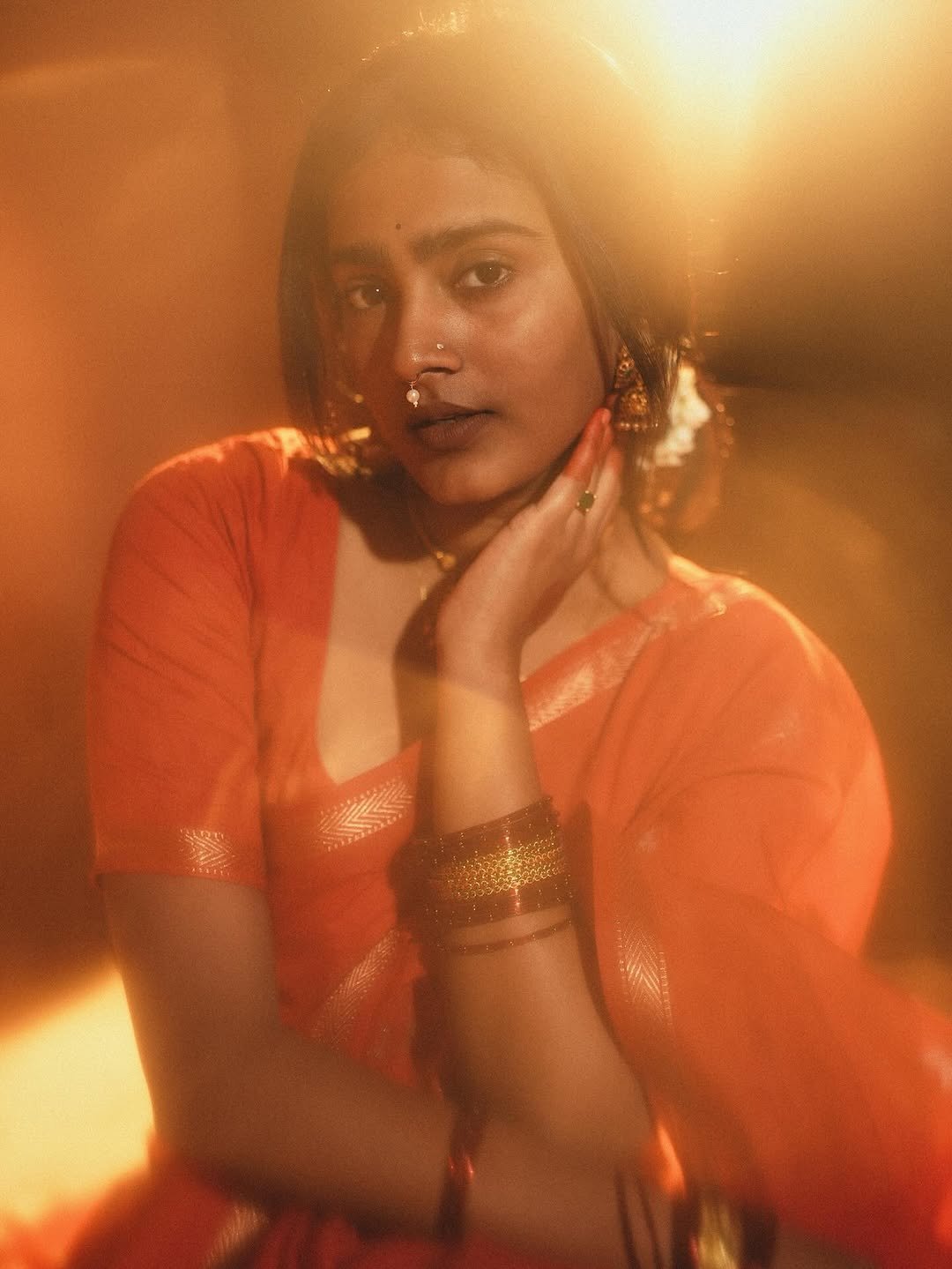 Yoga Lakshmi Golden Hour Close-Up – Traditional Nose Ring & Red Saree Glow (13)