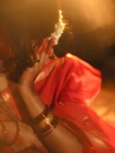 Yoga Lakshmi Golden Hour Close-Up – Traditional Nose Ring & Red Saree Glow (14)