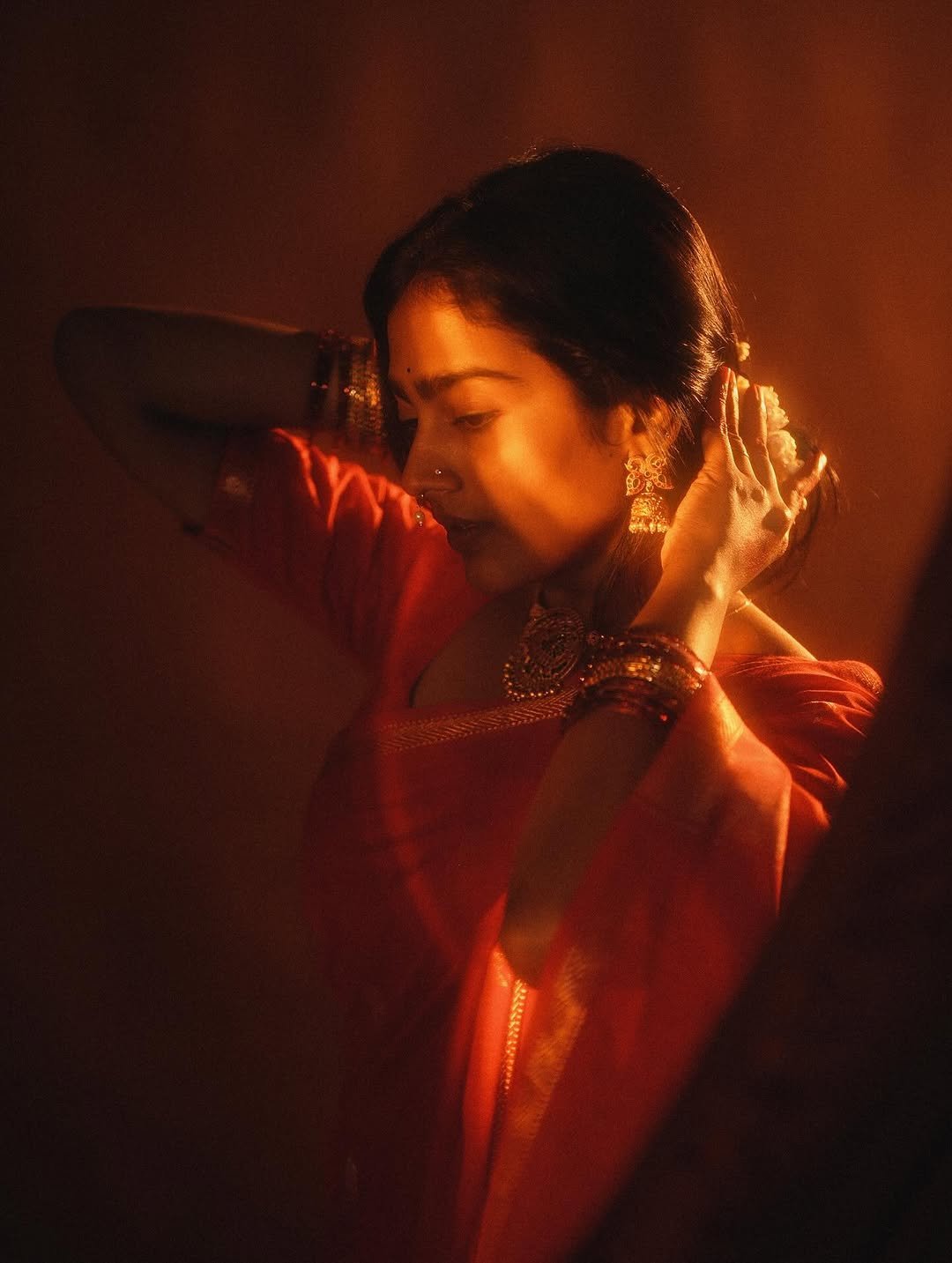 Yoga Lakshmi Golden Hour Close-Up – Traditional Nose Ring & Red Saree Glow (15)