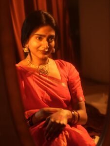 Yoga Lakshmi Golden Hour Close-Up – Traditional Nose Ring & Red Saree Glow (19)