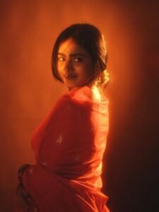 Yoga Lakshmi Golden Hour Close-Up – Traditional Nose Ring & Red Saree Glow (2)