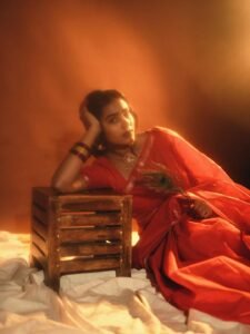 Yoga Lakshmi Golden Hour Close-Up – Traditional Nose Ring & Red Saree Glow (3)